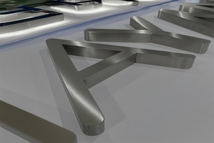 Rótulo exterior con letras de acero inoxidable sin iluminar