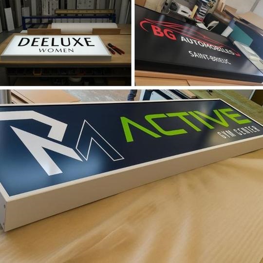 Carteles luminosos recién terminados en taller